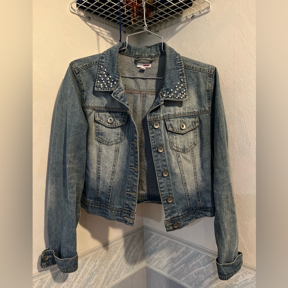 Jean jacket with studs on collar